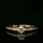 Timeless Round Solitaire Diamond Ring with Pavé Band - 18K Gold